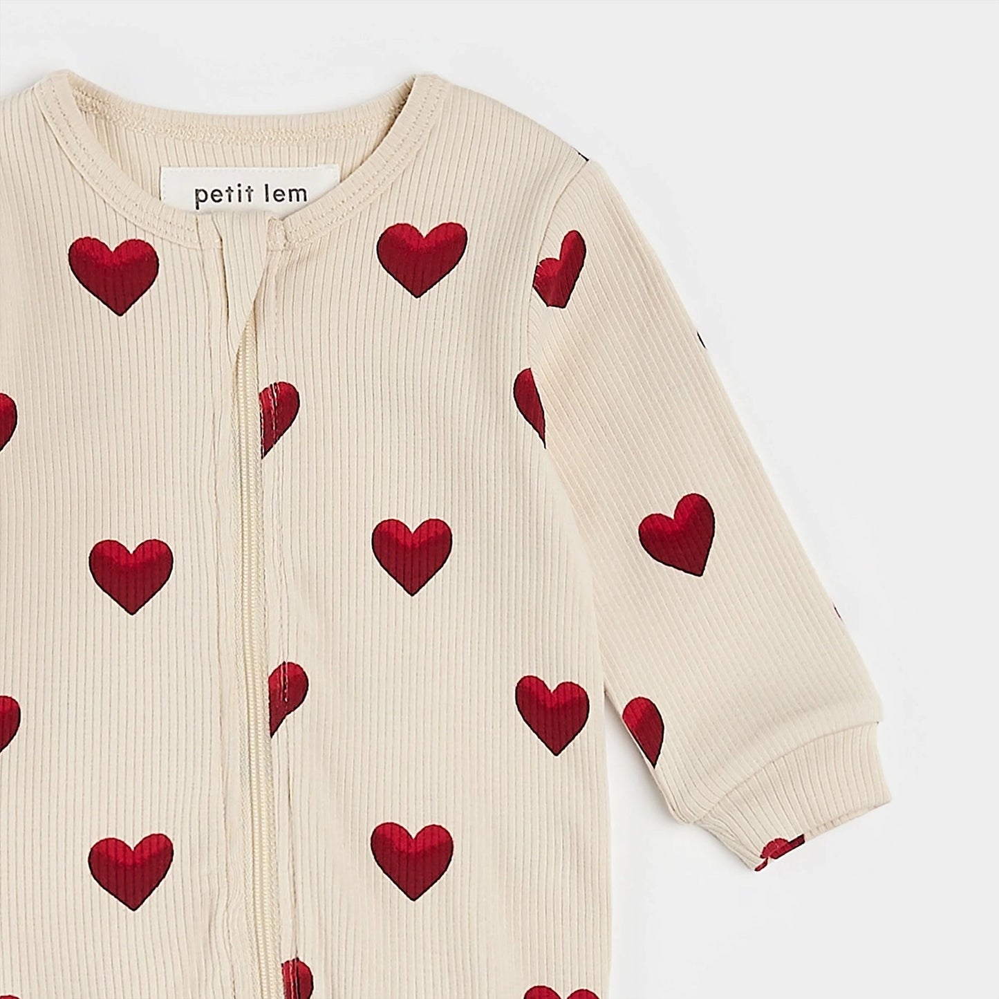 Petit Lem Footed Sleeper in Heart Rib