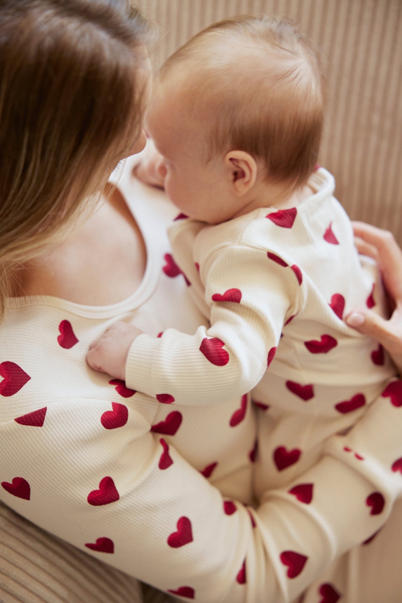 Petit Lem Footed Sleeper in Heart Rib