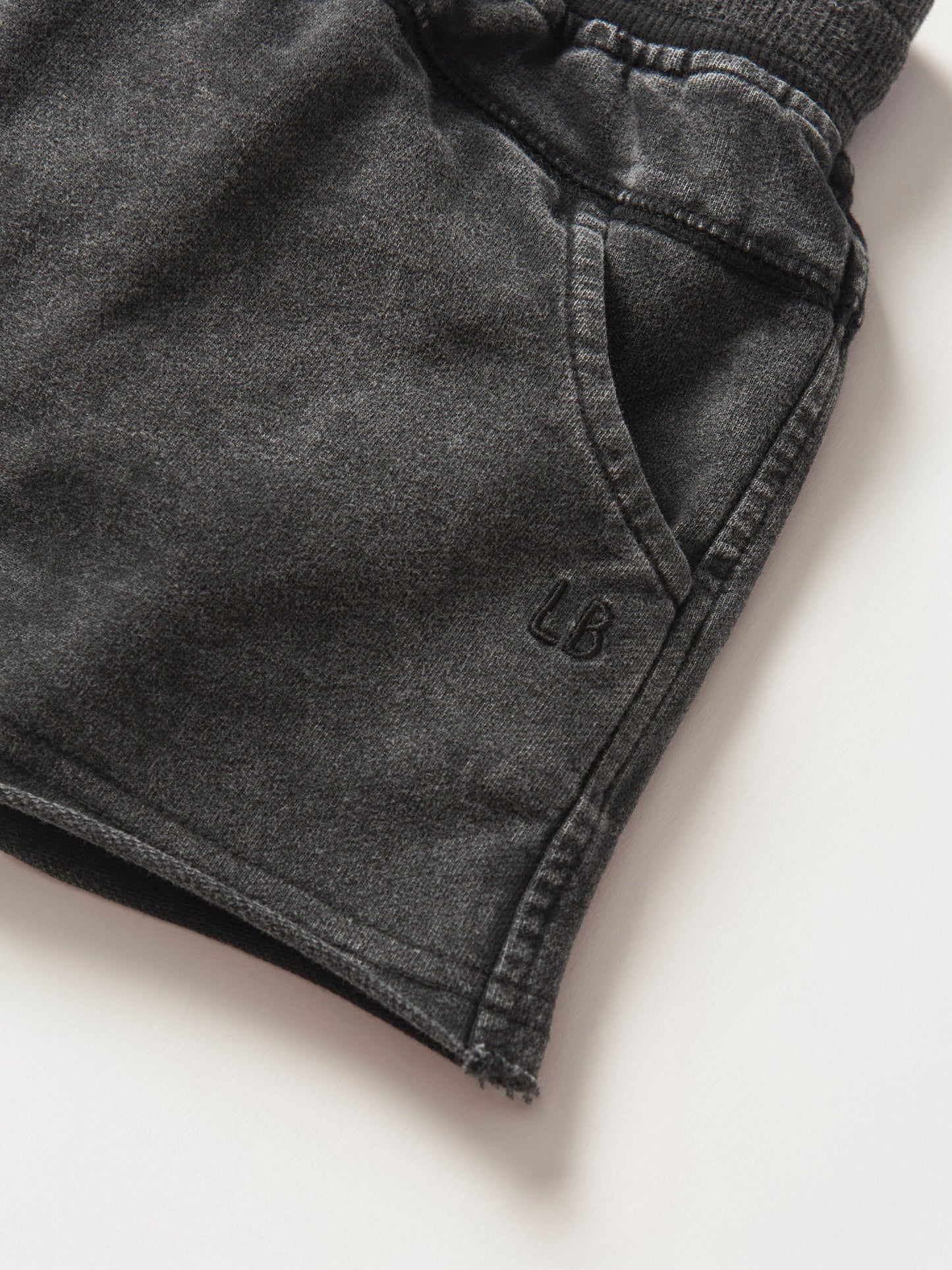 Little Bipsy Acid Wash Raw Edge Harem Short in Black