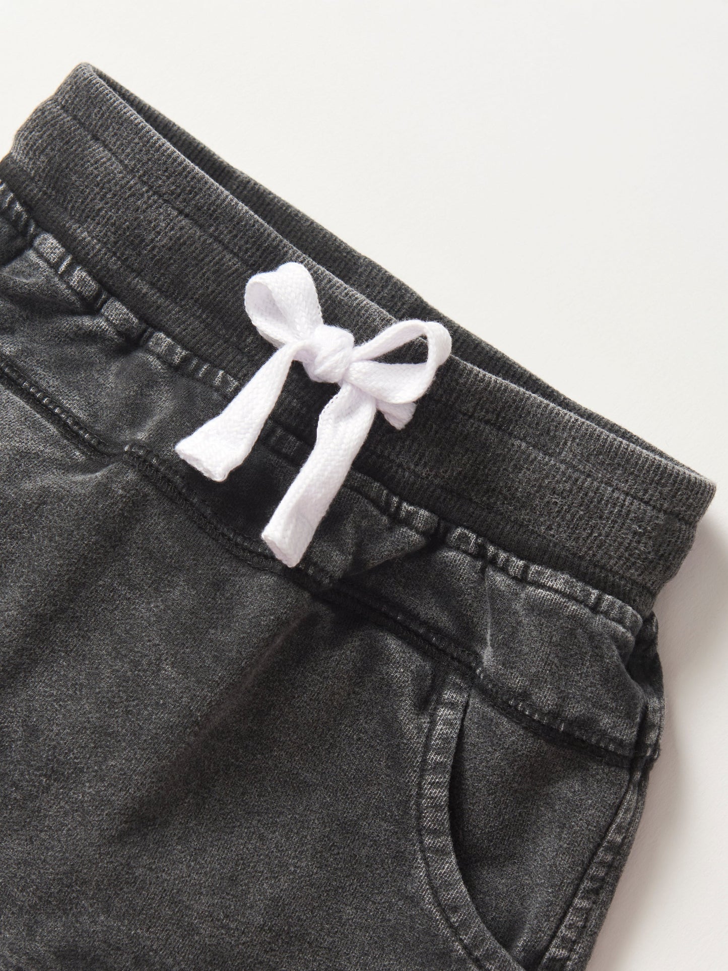Little Bipsy Acid Wash Raw Edge Harem Short in Black