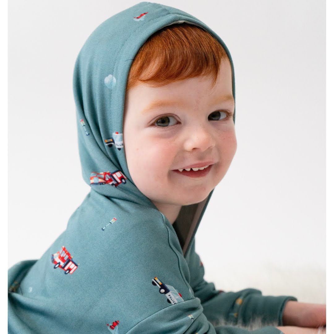 Belan J Baggy Hooded Romper in Emergency Vehicles