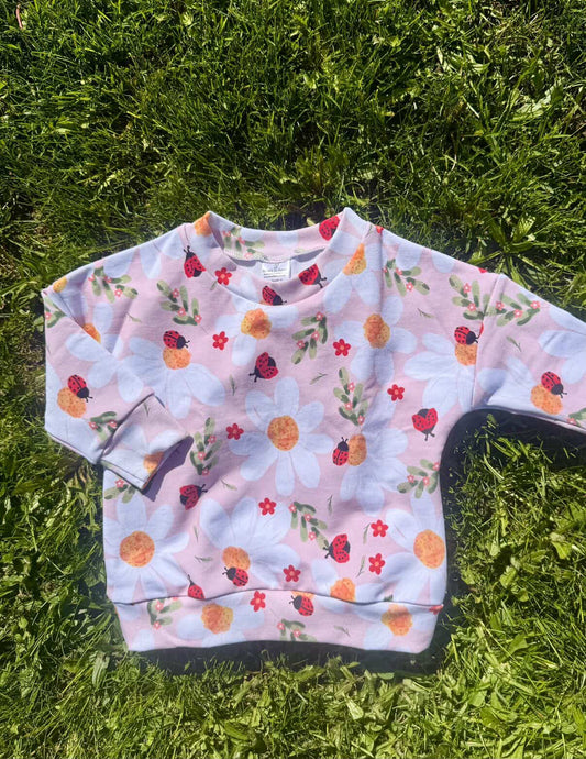 Reeses Little Pieces “Ladybug Floral” Crewneck