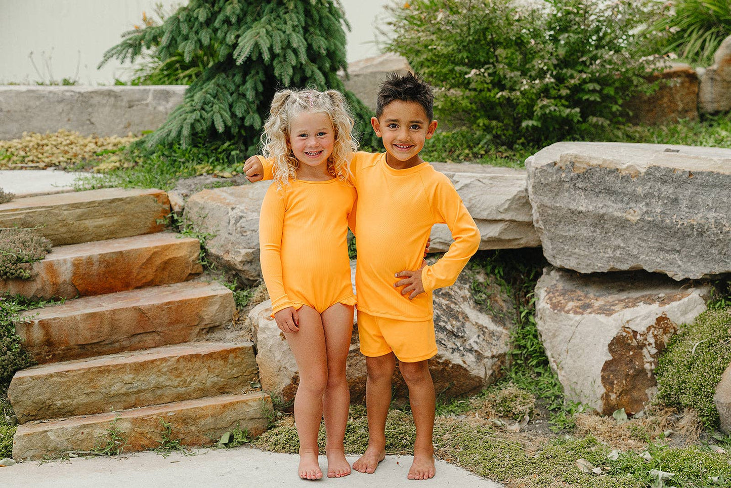 Current Tyed "Brights" Neon Orange Ruffle Rashguard Suit