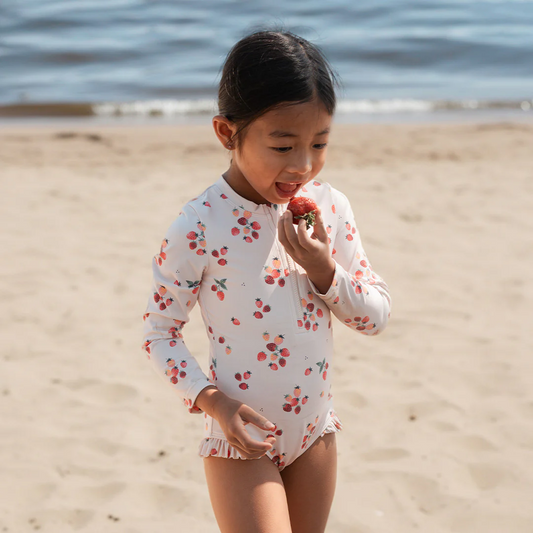 Petit Lem Long Sleeve One Piece Swimsuit in Strawberries on Light Pink