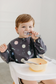LouLou Lollipop Long Sleeve Bib in Planets