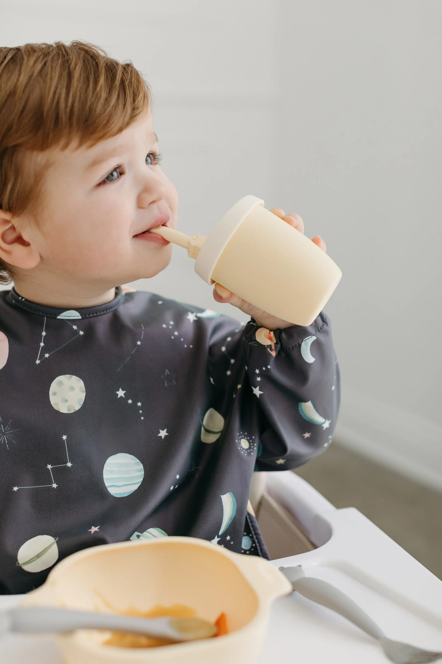 LouLou Lollipop Long Sleeve Bib in Planets