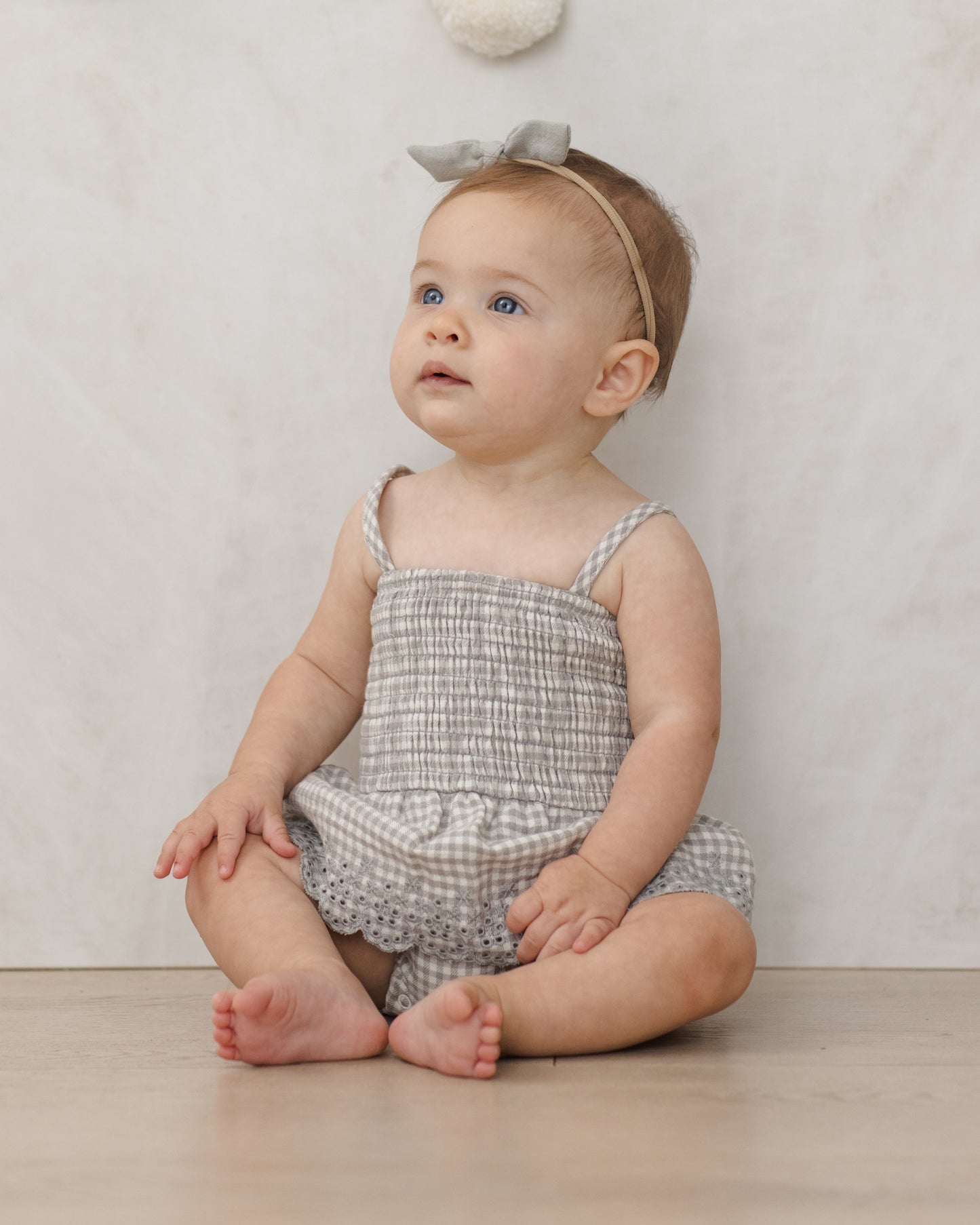Quincy Mae Smocked Skirted Romper in Sage Gingham