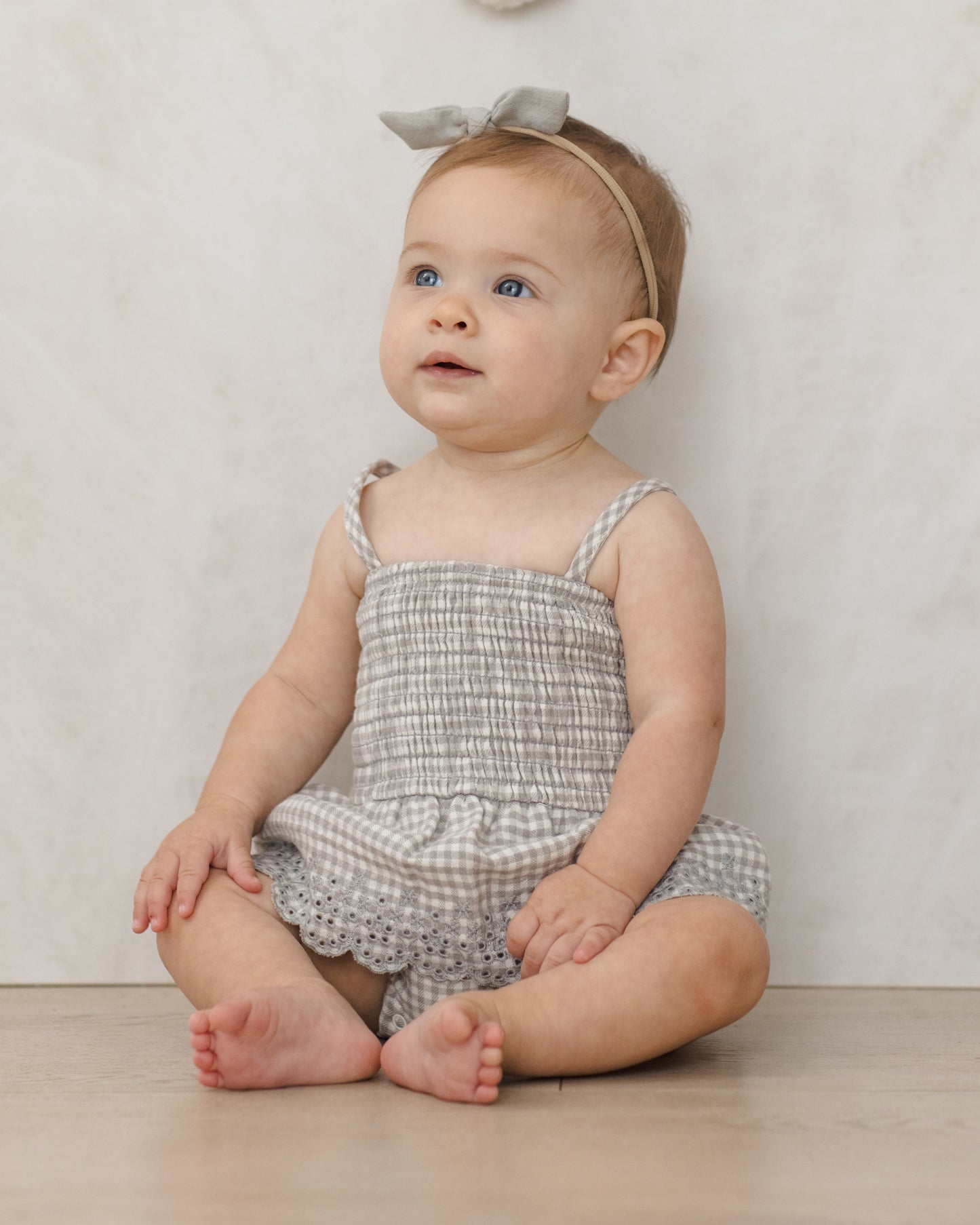 Quincy Mae Smocked Skirted Romper in Sage Gingham