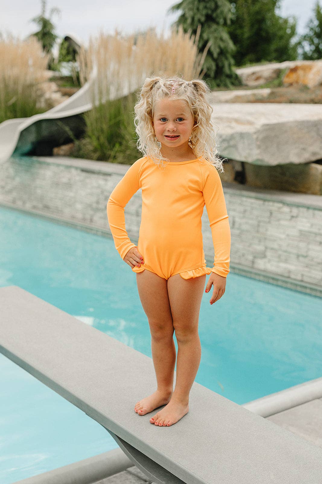 Current Tyed "Brights" Neon Orange Ruffle Rashguard Suit